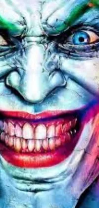 This phone live wallpaper features a colorful and creepy close-up of a clown's face, with a huge and unsettling smile in vibrant technicolor