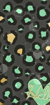 This phone live wallpaper is a visual feast designed with a chic gradient of black, green, and gold, adorned with a heart symbol on its screen
