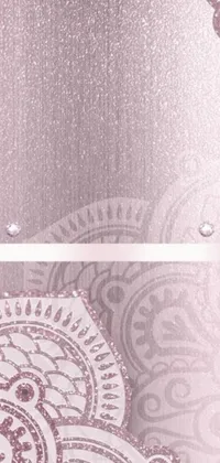 This beautiful live wallpaper features a close-up of an ornate metal plate with a vector art-inspired diamond and rose quartz pattern encrusted with sparkling jewels