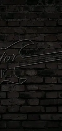 Looking for the perfect wallpaper to add some edge to your phone? Check out this brick wall live wallpaper with a guitar sign! The dark and moody aesthetic is perfect for those who appreciate grunge or gothic inspired designs