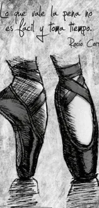 This live wallpaper depicts a stunning monochromatic drawing of ballet shoes that are sure to captivate anyone who sees it