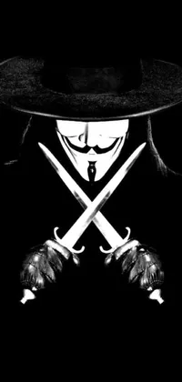 This phone live wallpaper features a striking black and white photo of an enigmatic figure wearing an anonymous mask and holding two knives