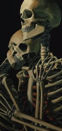 This phone live wallpaper features an eerie painting of a cowboy skeleton and a human skull hugging each other
