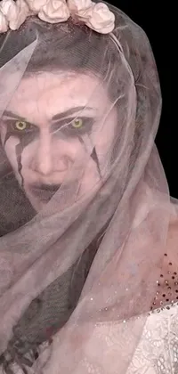 This mesmerizing phone live wallpaper showcases a mysterious individual wearing a veil in close up