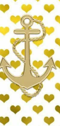 The phone live wallpaper boasts a stunning anchor design with delicate heart details set against a gold and white background