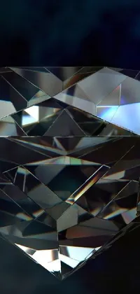 Looking for a luxurious live wallpaper for your phone's home screen? Check out this stunning digital rendering of a diamond on a blue background