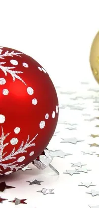 Get into the Christmas spirit with our phone live wallpaper featuring a close-up of a red and gold Christmas ornament
