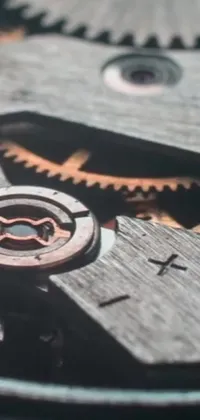 Looking for a stunning live wallpaper for your phone? Check out this intricately designed masterpiece featuring close-up footage of a watch's gears