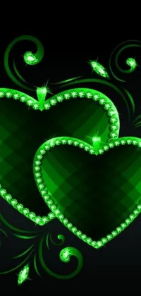 This dynamic phone live wallpaper showcases two vector art green hearts on a bold black backdrop