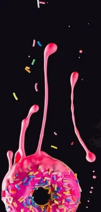 Indulge yourself with this delightful 3D live wallpaper of a pink donut with colorful sprinkles on a black background