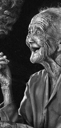 The phone live wallpaper features a hyper-realistic black and white photo of an old woman smoking a cigarette