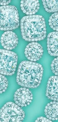 Transform your phone's home screen into a luxurious and glamorous display with this stunning live wallpaper featuring a collection of exquisite diamonds