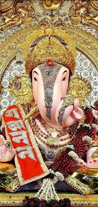 This phone live wallpaper showcases a magnificent statue of an elephant, symbolizing the Hindu god of wealth, Samikshavad