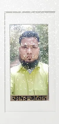 This stunning live wallpaper depicts a man with a beard wearing a vibrant yellow shirt against a hurufiyya-inspired frame, all set in full-color, optimized for both phone and PC screens