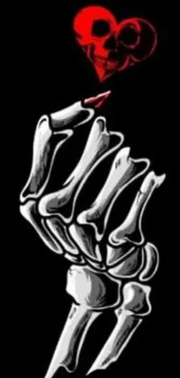 This phone live wallpaper depicts a beautifully drawn hand holding a bright red heart tattoo against a black background
