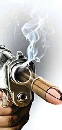 This lively phone wallpaper showcases a detailed vivid image of a smoking gun