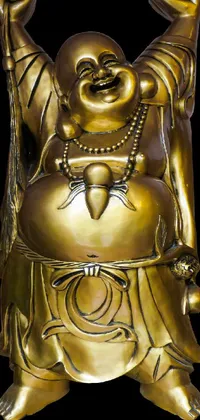 Add a radiant touch to your phone with this golden live wallpaper featuring a laughing buddha