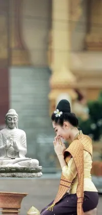 This delightful phone live wallpaper showcases a serene and picturesque scene with a beautiful statue and amazing Thai architecture