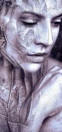 This stunning live phone wallpaper features an airbrush painting of a mystical woman with leaves on her face