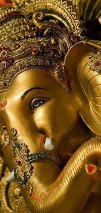 This phone live wallpaper features a stunning close-up of a majestic elephant statue which depicts the revered Hindu God Ganesha