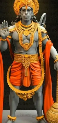 This phone live wallpaper depicts a stunning statue of a Hindu deity standing against a black background