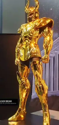 Experience the incredible gold statue live wallpaper with intricate armor designs for your smartphone