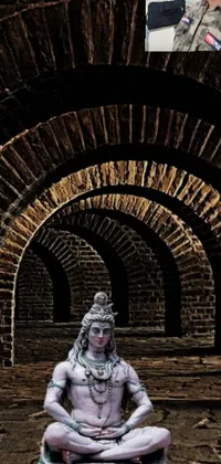 This live wallpaper features a haunting design of a statue sitting in the center of a tunnel