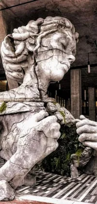 This phone live wallpaper showcases a dystopian concrete art statue of a cyborg woman holding a plant in a cracked Reichstag Germany landscape