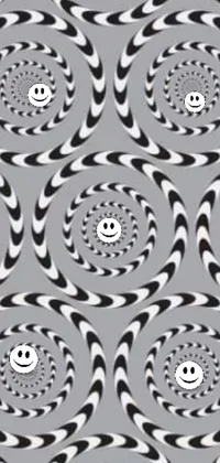 This phone live wallpaper features a smiling face on a cell phone case set against a swirling background