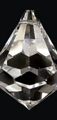 This live wallpaper features a stunning 3D rendering of a diamond in crystal cubism style