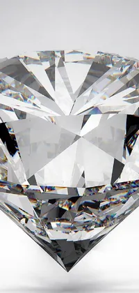 This live wallpaper showcases a breathtaking digital rendering of a round diamond set on a white surface