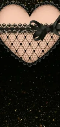 This modern live wallpaper features a digital art heart in black with a fishnet corset and choker design, set on a black sky with stars
