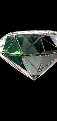 Looking for an eye-catching and unique live wallpaper for your mobile device? This stunning wallpaper features a diamond-shaped object with a black background, adorned with a vibrant green light and a crisp white light