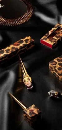 This phone live wallpaper features a stunning leopard print case on a dark, glossy surface