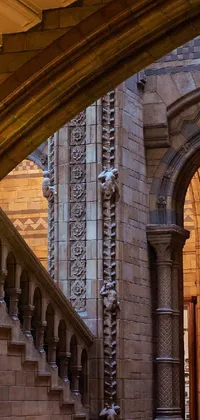 Introducing a stunning live wallpaper for your smartphone! Featuring a Romanesque-style building with high arches and a grand staircase, this wallpaper is sure to captivate you