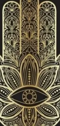 This gold hamsa wallpaper is a vector art design that is highly detailed & intricate