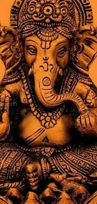 Looking for an elegant and detailed live wallpaper for your phone? Check out this digital rendering of a Ganesha statue, featuring a close-up of an elephant with intricate patterns etched onto its surface