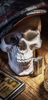 This phone live wallpaper depicts a skull and glass situated atop a wooden table, with a portrait of a card player man in the backdrop