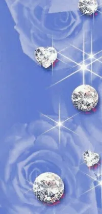 This live phone wallpaper showcases an elegant assembly of diamonds arranged neatly on top of a cool blue surface