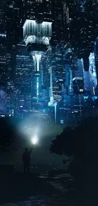 This live phone wallpaper features a man standing in the midst of a sprawling night-time cityscape, evocative of futuristic sci-fi movies and digital art
