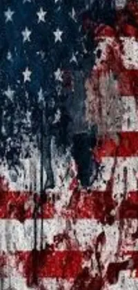 This phone live wallpaper features a realistic American flag painted on a building, drenched in blood spatters