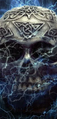 This phone live wallpaper displays a highly-detailed digital image of a skull with celtic symbols in the background and lightning striking all around