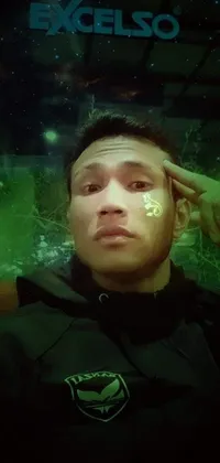 This live wallpaper features a close up of a person wearing a jacket, looking straight at the camera in a selfie pose