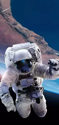 This space-themed live wallpaper depicts an astronaut in a sleek spacesuit with the Earth in the background