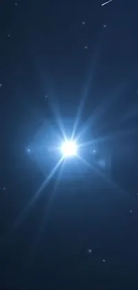 This live wallpaper showcases a bright star that shines brilliantly in the night sky, with mesmerizing blue lighting and sun rays adding extra dazzle