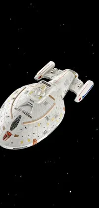 This live wallpaper depicts a futuristic Star Trek ship, with intricately detailed white armor panels glowing in the darkness of space