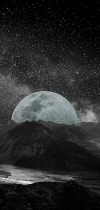 Add a touch of mystique to your smartphone with this stunning black and white live wallpaper featuring a full moon and alien mountains