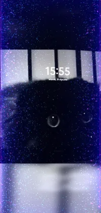 This live wallpaper depicts a stunning close-up image of a clock on a phone