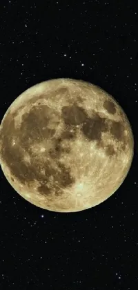 This phone live wallpaper features a high-detail 4k picture of a yellowish full moon with stars twinkling in the background