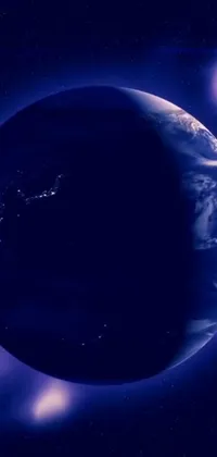 Looking for a serene live wallpaper for your phone? Look no further than this gorgeous view of the earth from space at night